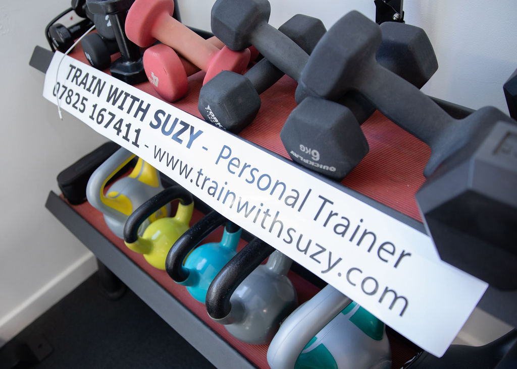 Dumbbells lined up in Suzy's private Sheffield gym